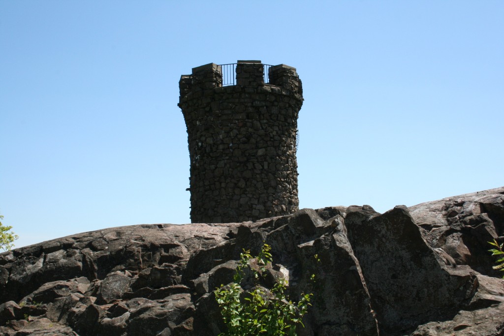 Rook on rock - Castle Craig in Meriden, Connecticut. Trails Day is a national effort to help people be aware how wonderful it is to get outside and explore.